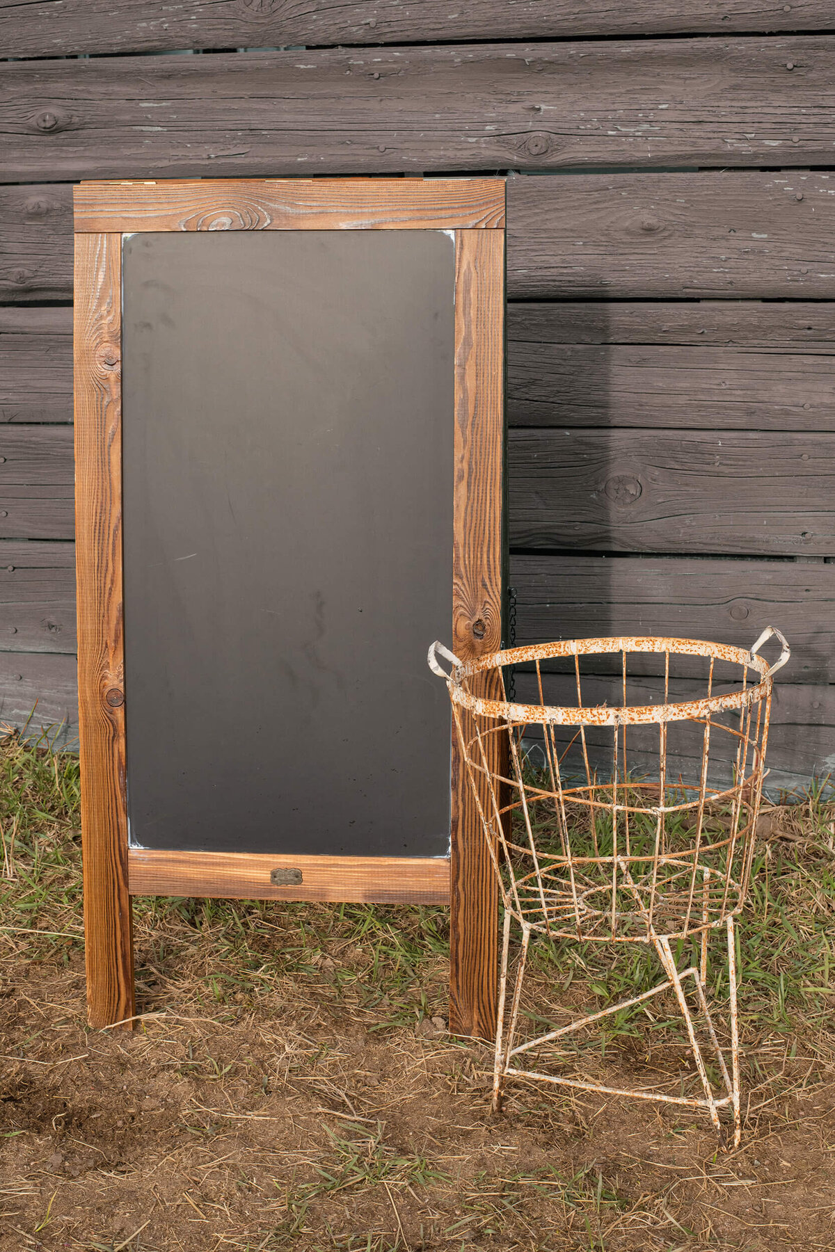 wood chalkboard sign and wire basket