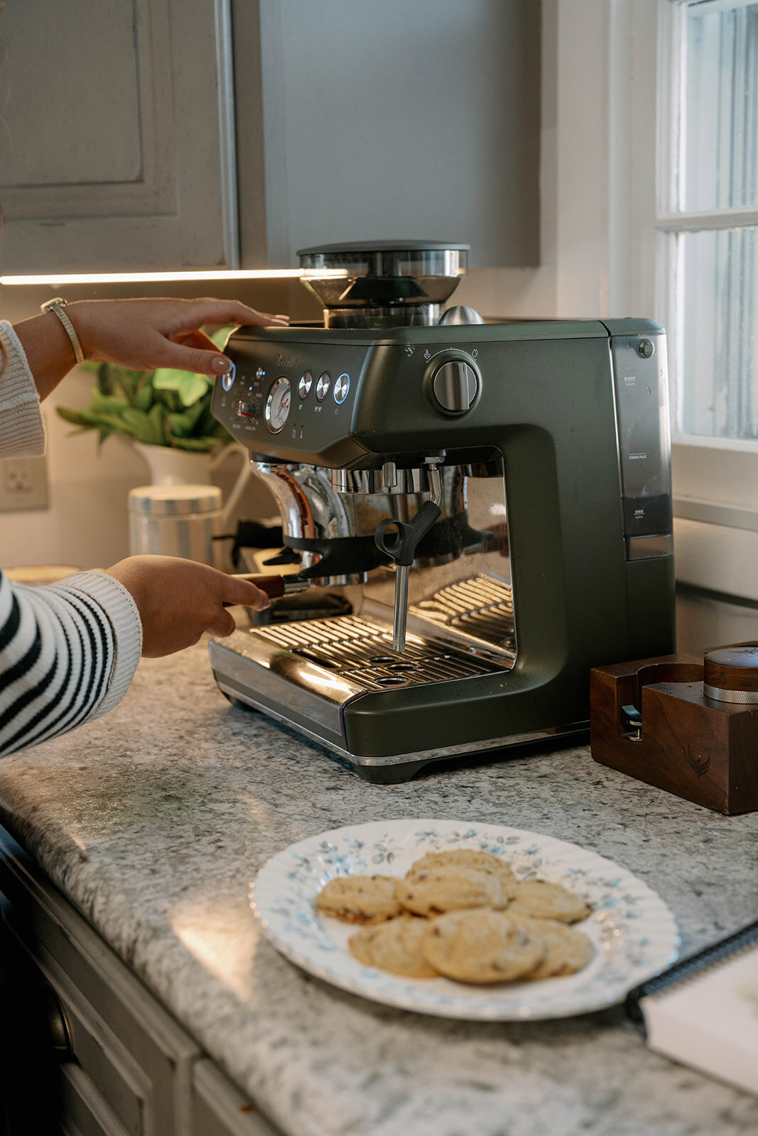Plate of cookies next to a planner and coffee during a cozy lifestyle branding session in Indiana.