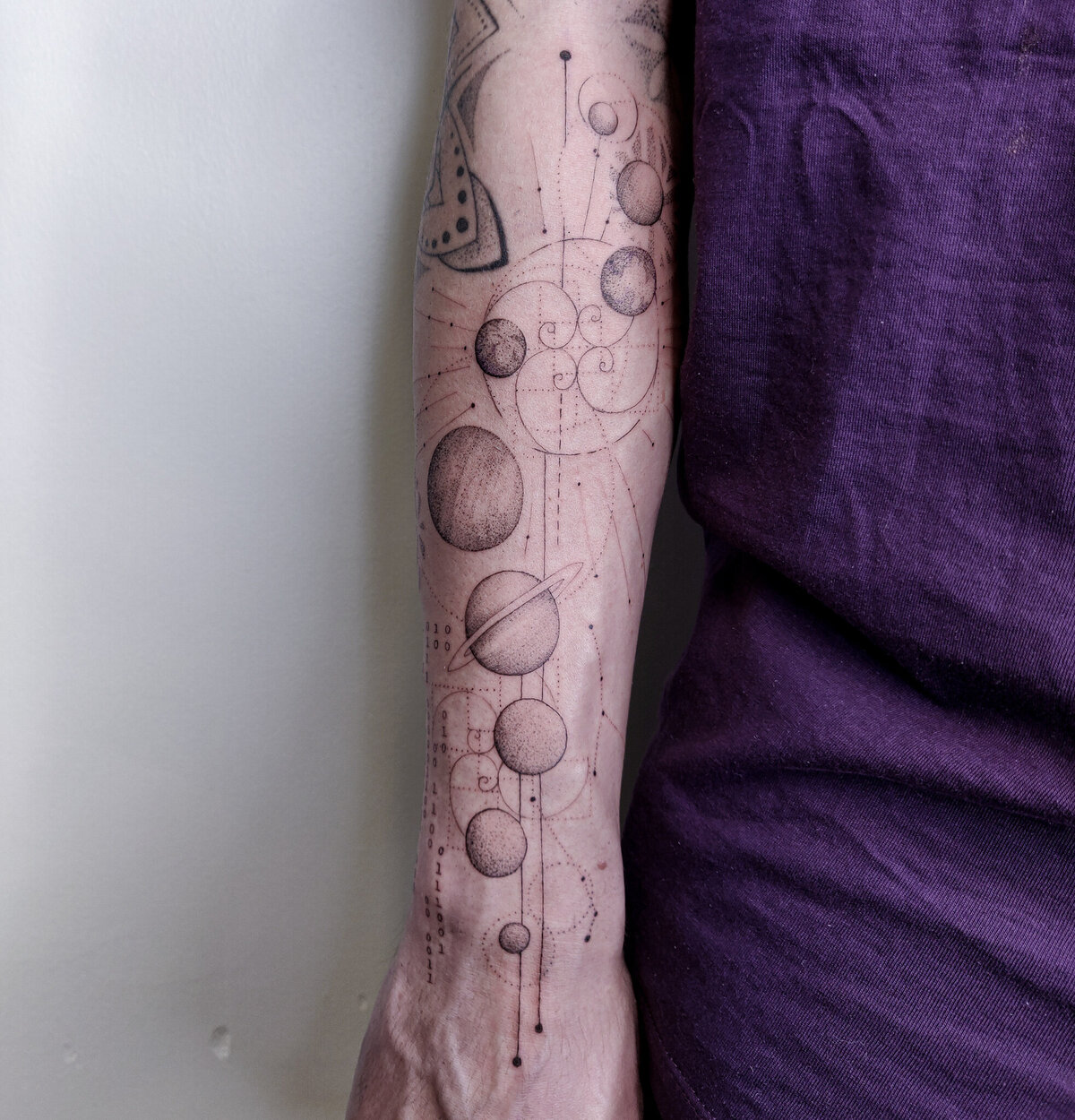 planets tattoo, solar system tattoo,  golden spiral tattoo, binary tattoo, dotwork tattoo, fine line tattoo