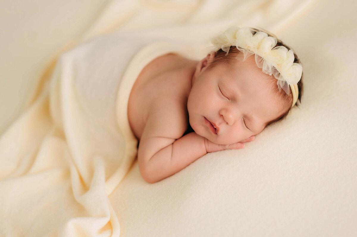 Infant posed for Newborn Photos in Charleston, SC.