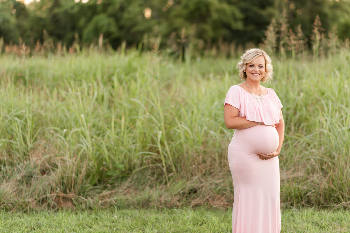 Maternity Session long pink dress at park by Michelle Lynn Photography