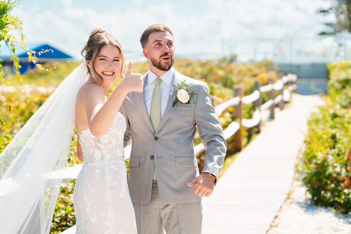 Cape Cod beachfront wedding photos at the Popponesset Inn capturing authentic moments and scenic shoreline.