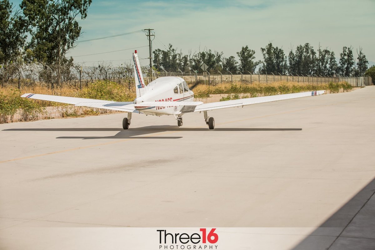 Husband and Wife leave ceremony in small plane