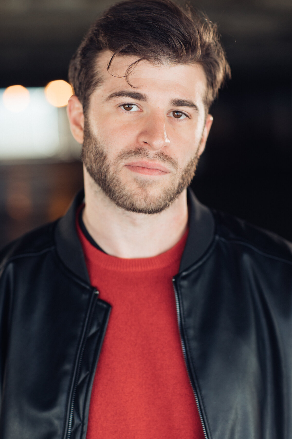 Young Man Wearing Black Leather Jacket with Inner Red Shirt Headshot in LA