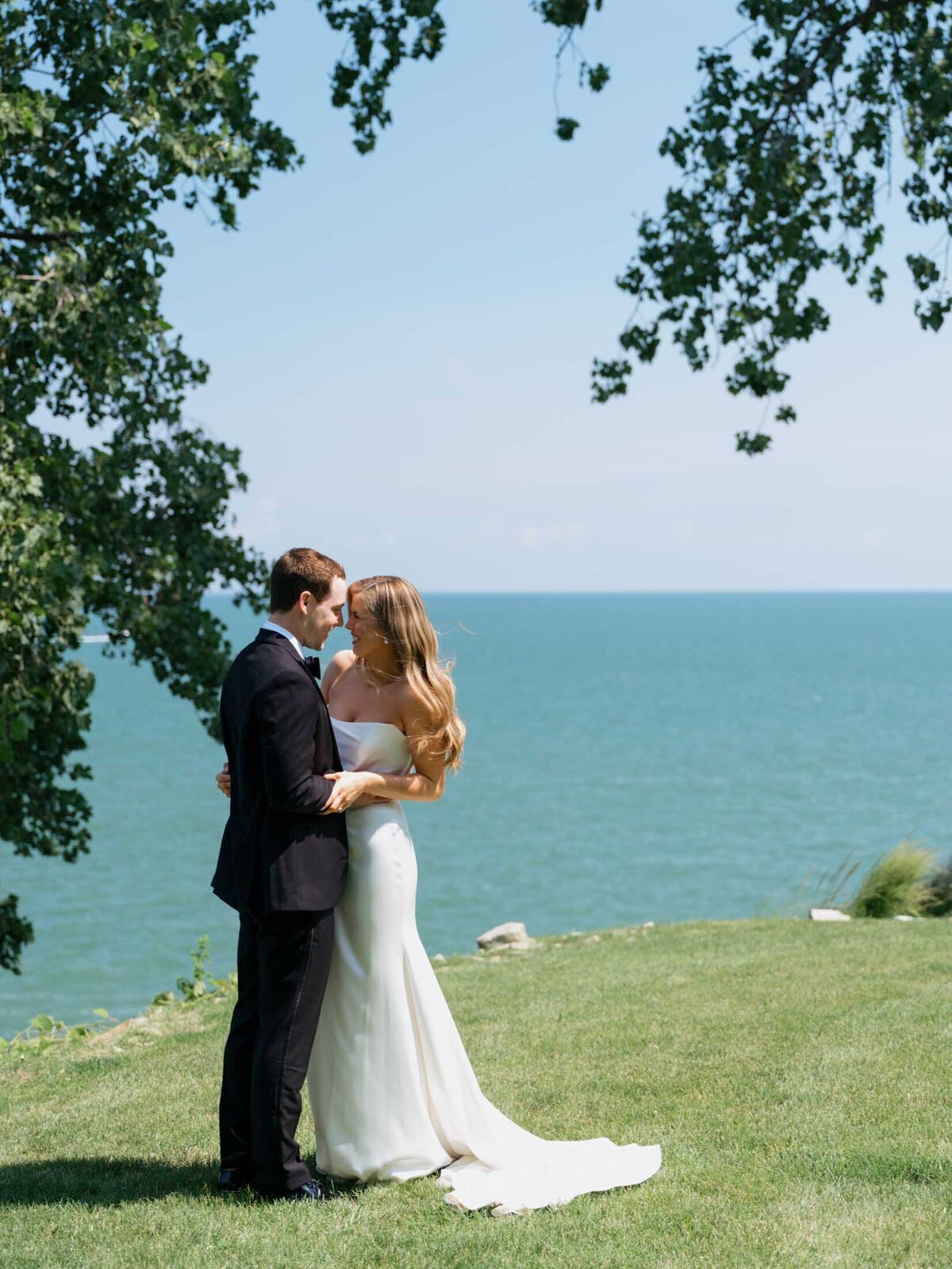 Bride and groom by Lake Erie in Cleveland before their wedding ceremony