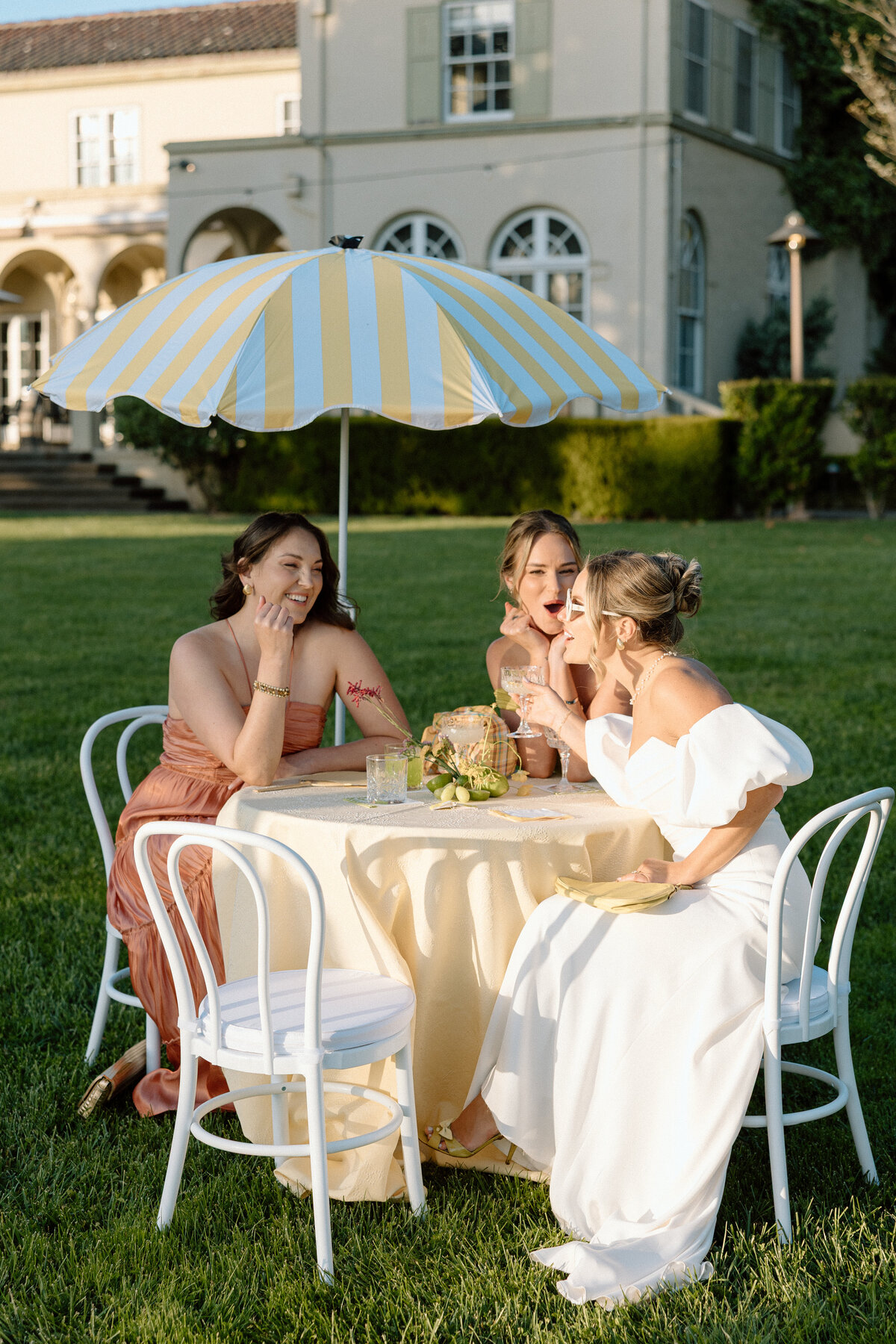 friends-with-striped-umbrella