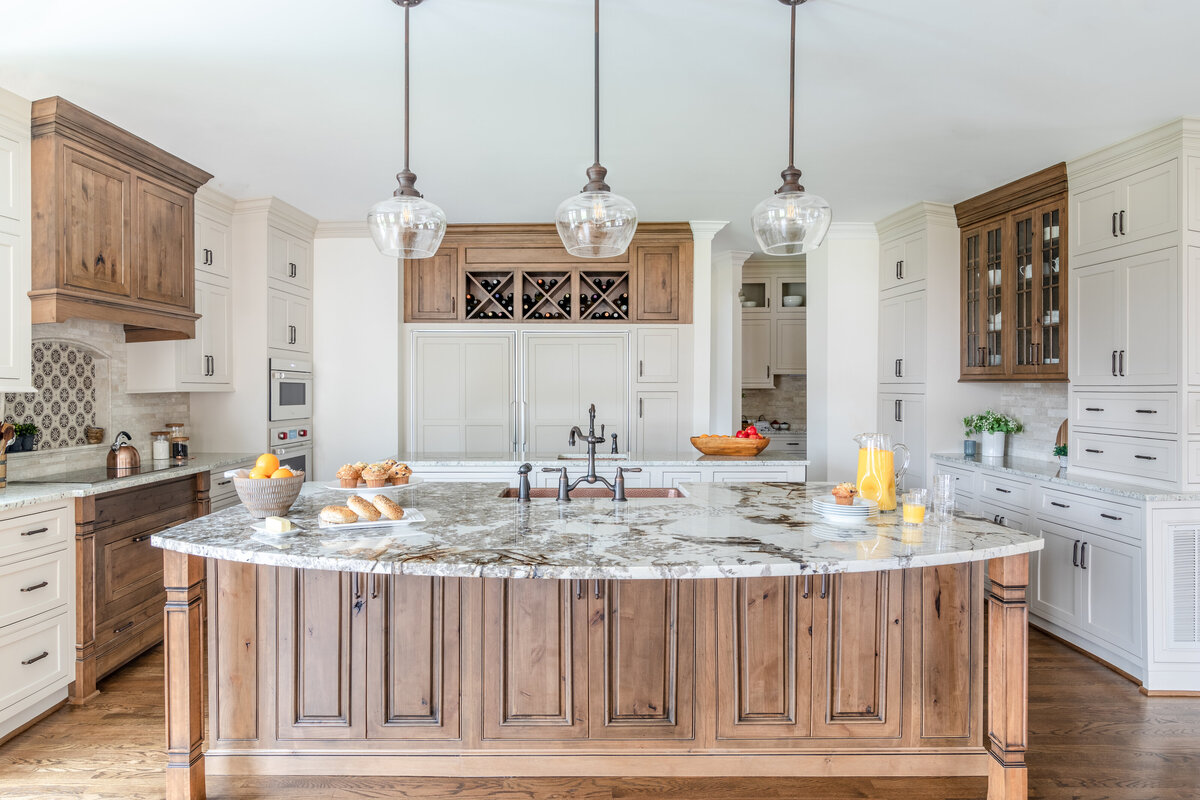 Interior Photography of wood and white kitchen featuring two islands
