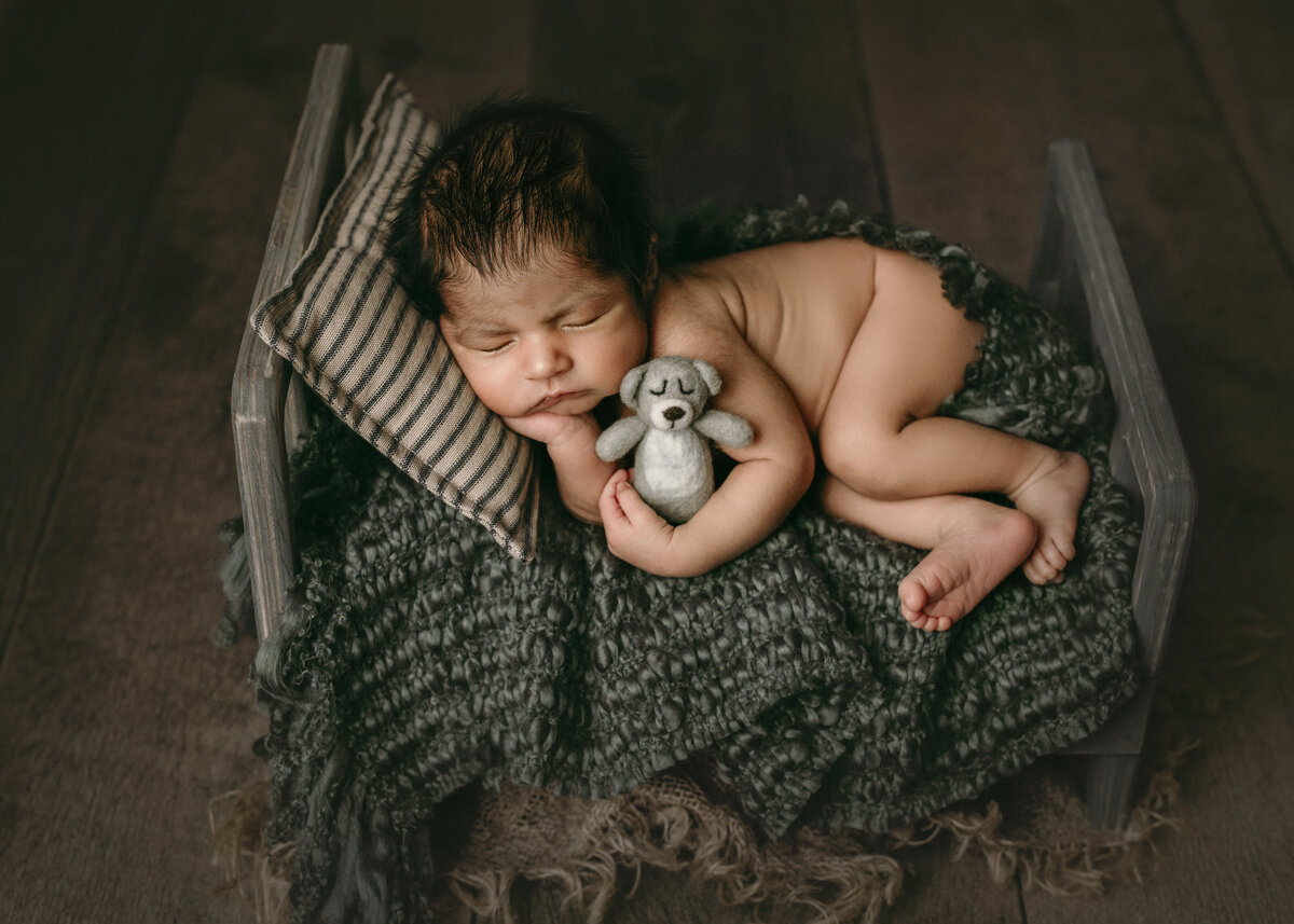 cuddles and snuggles with Newborn Photographer Syracuse New York
