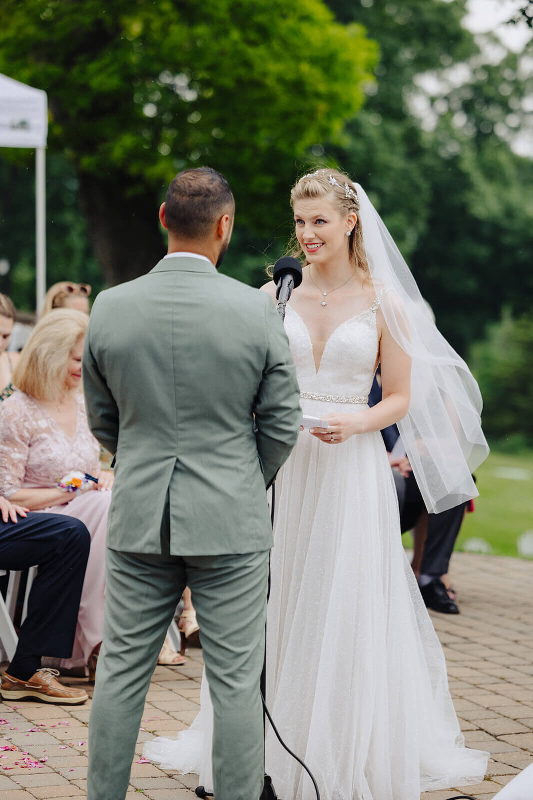 Bride and groom exchanging vows at Mansion at Keuka Lake, NY