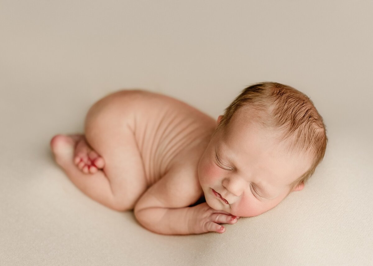 newborn baby asleep for their photos