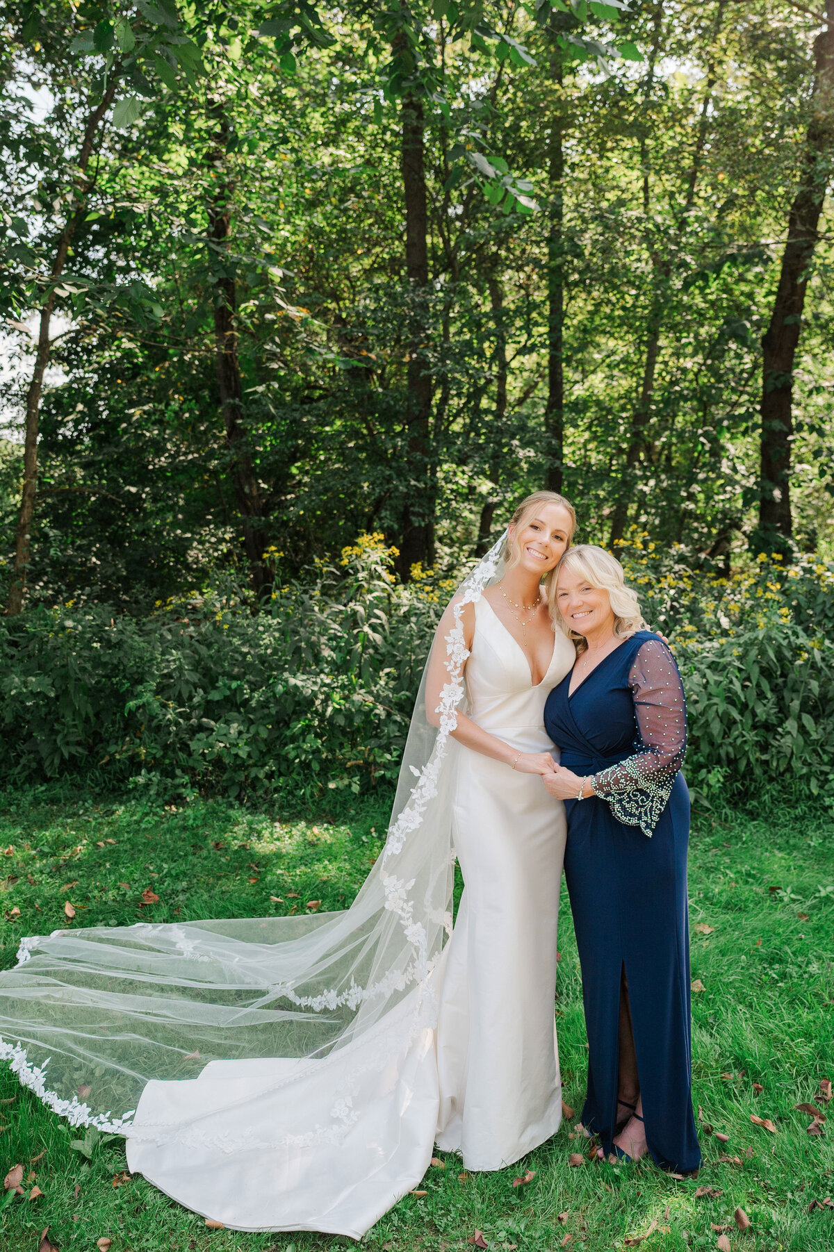 mom and bride wedding photo at summer camp pennsylvania wedding