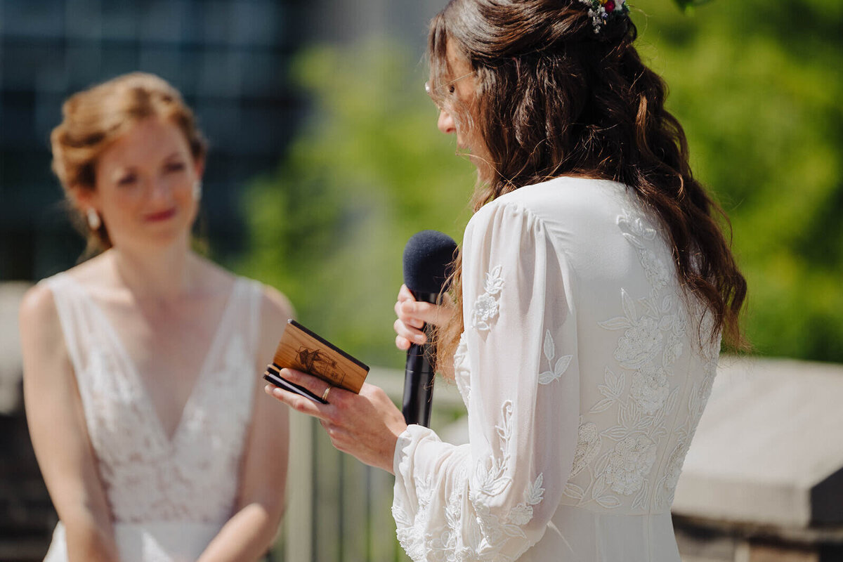 Bride making a speech at Cornell University wedding