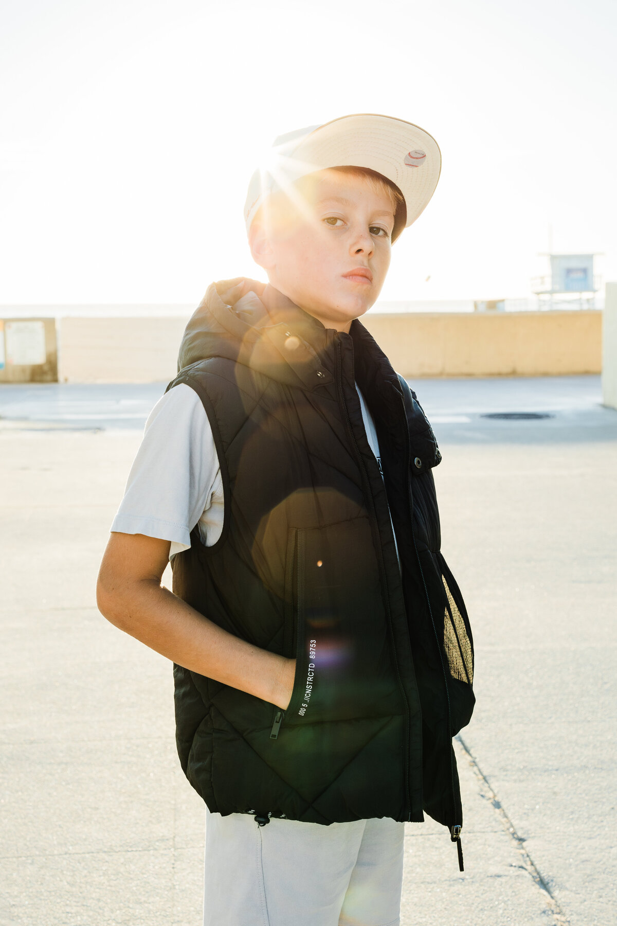 boy-with-sunflare-on-hermosa-beach-walk-street