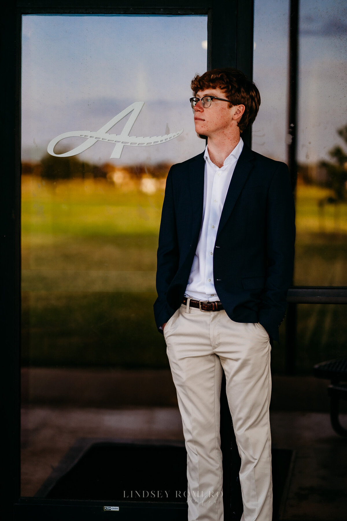 guy pose for high school senior photos in Youngsville, la