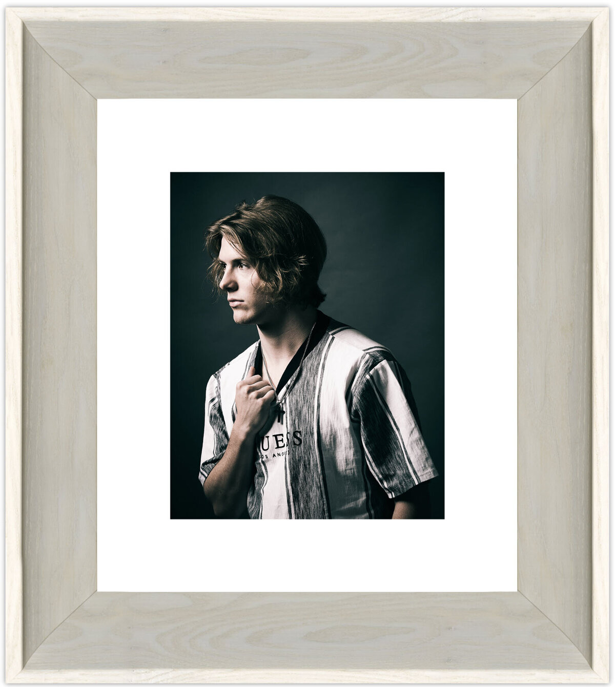 Senior Gabe works the look with confidence, mounted in a Gallery White frame with White Mat