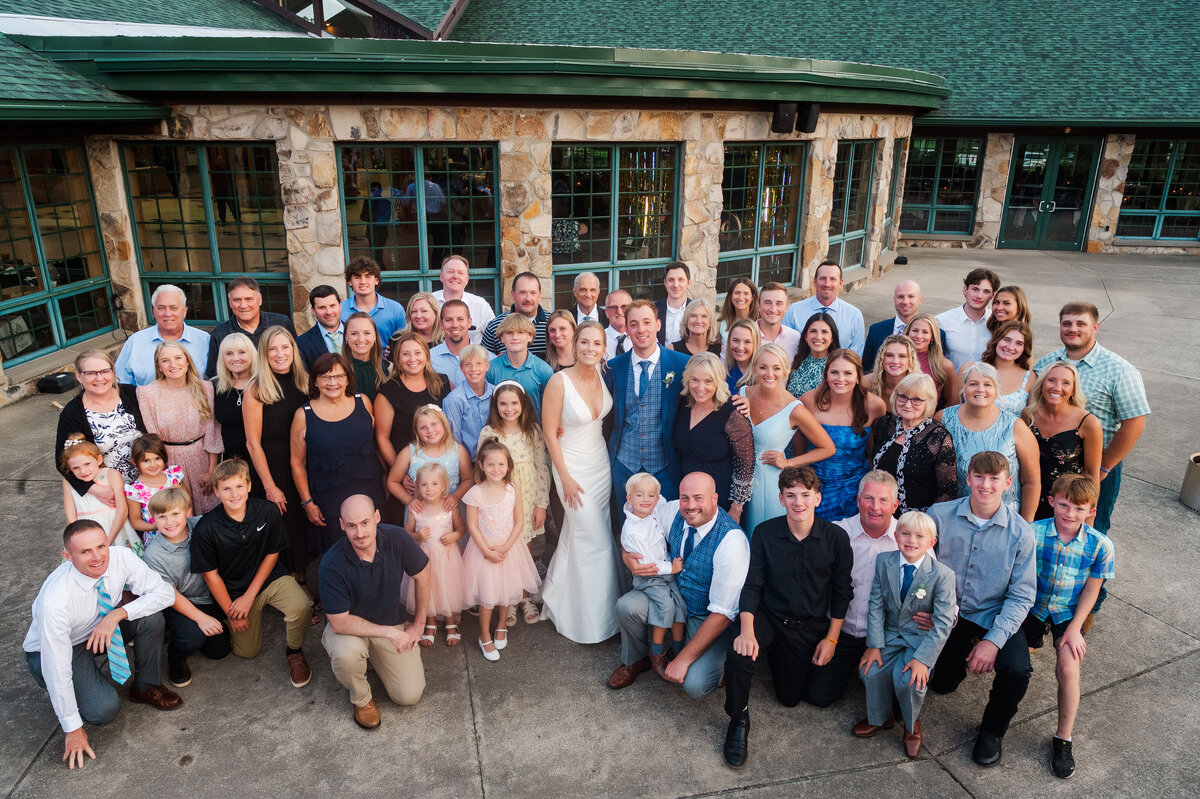 large group outside of kramer hall on wedding day