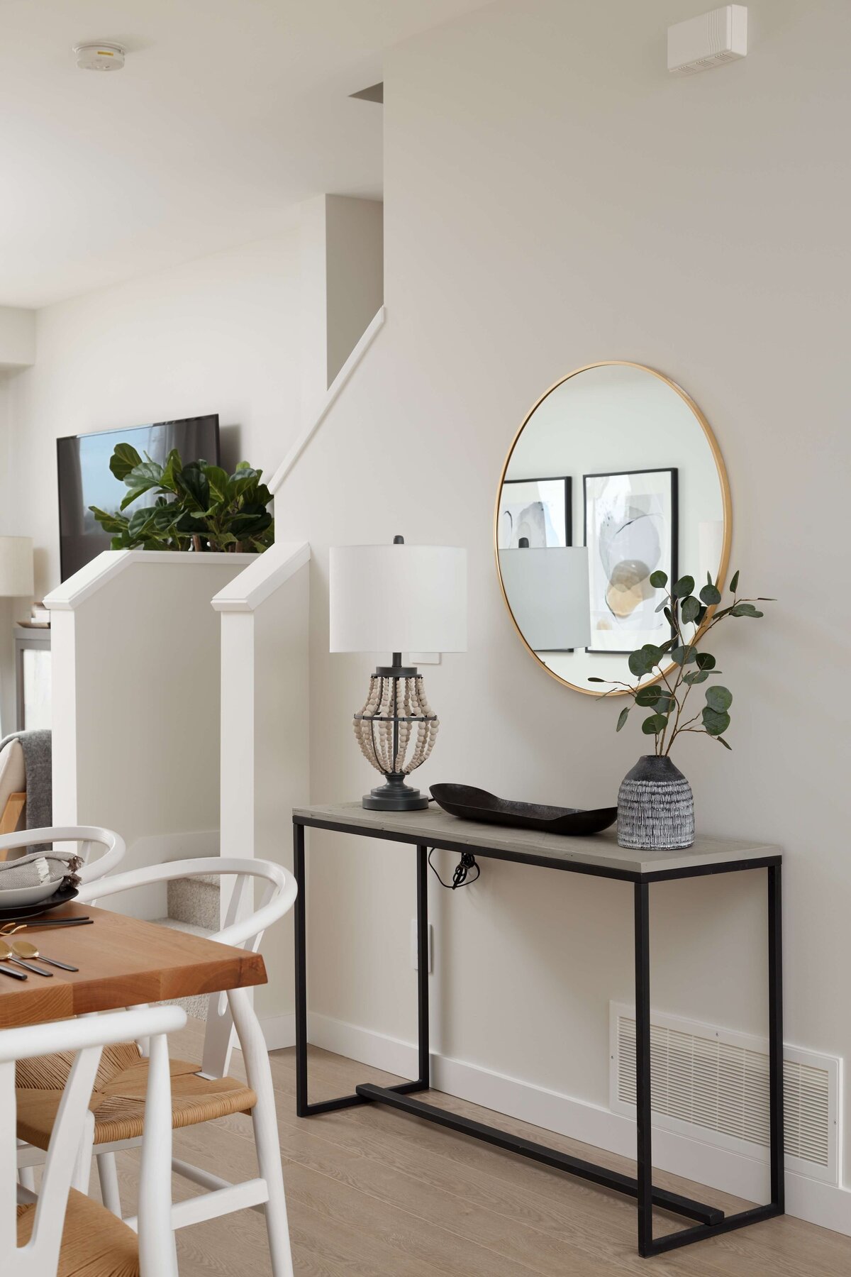 Entry console and mirror at Tsawwassen Landing display suite