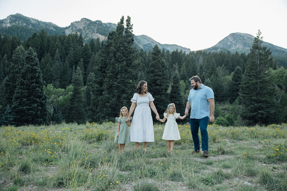 utah county family smiles together in family photography session at tibble fork