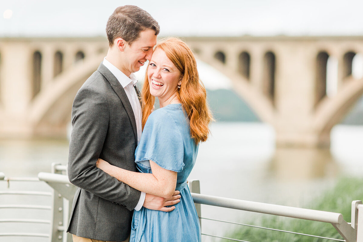 couple hugs for engagement photo