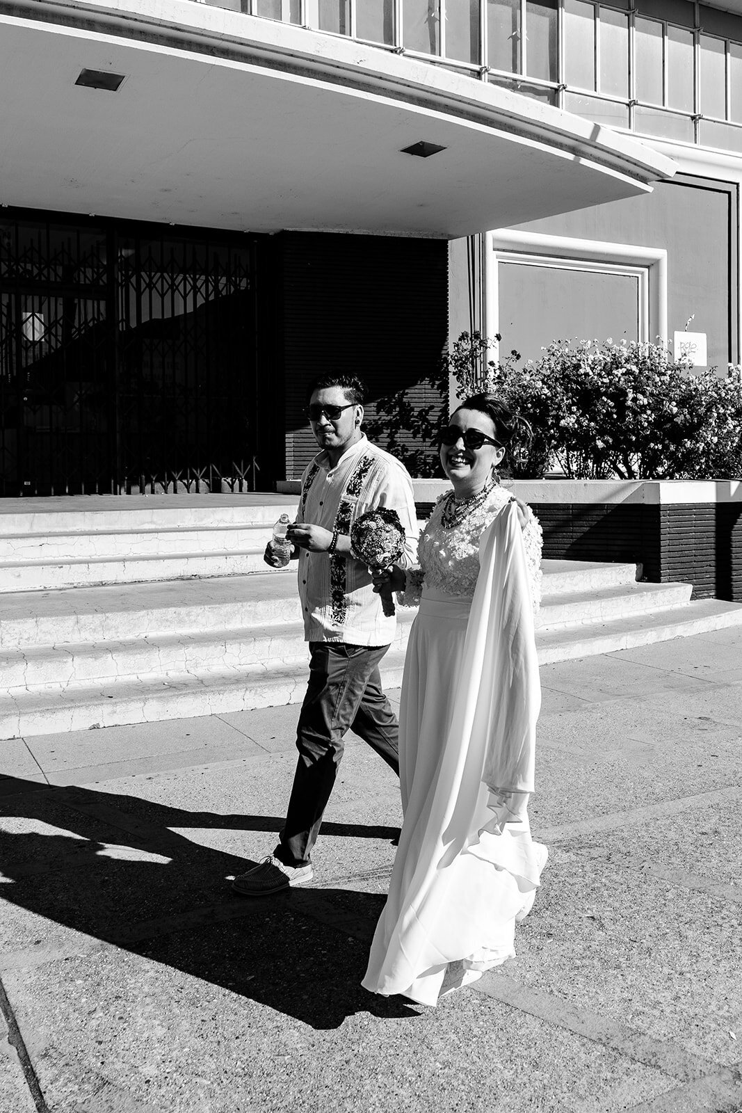Modern elopement portraits in Downtown LA with urban city backdrop