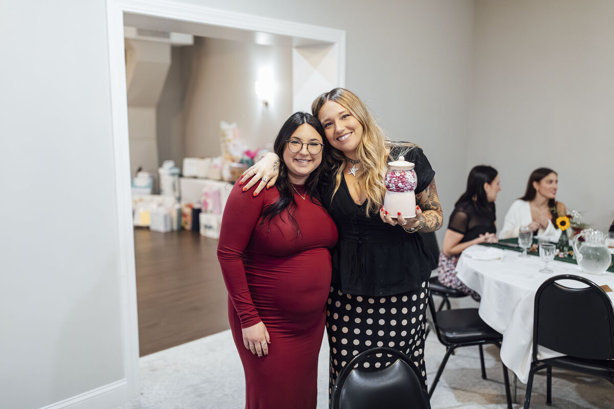 Baby Shower Photographer | Mom-to-be celebrating with guests at elegant indoor venue | Somerset, New Jersey