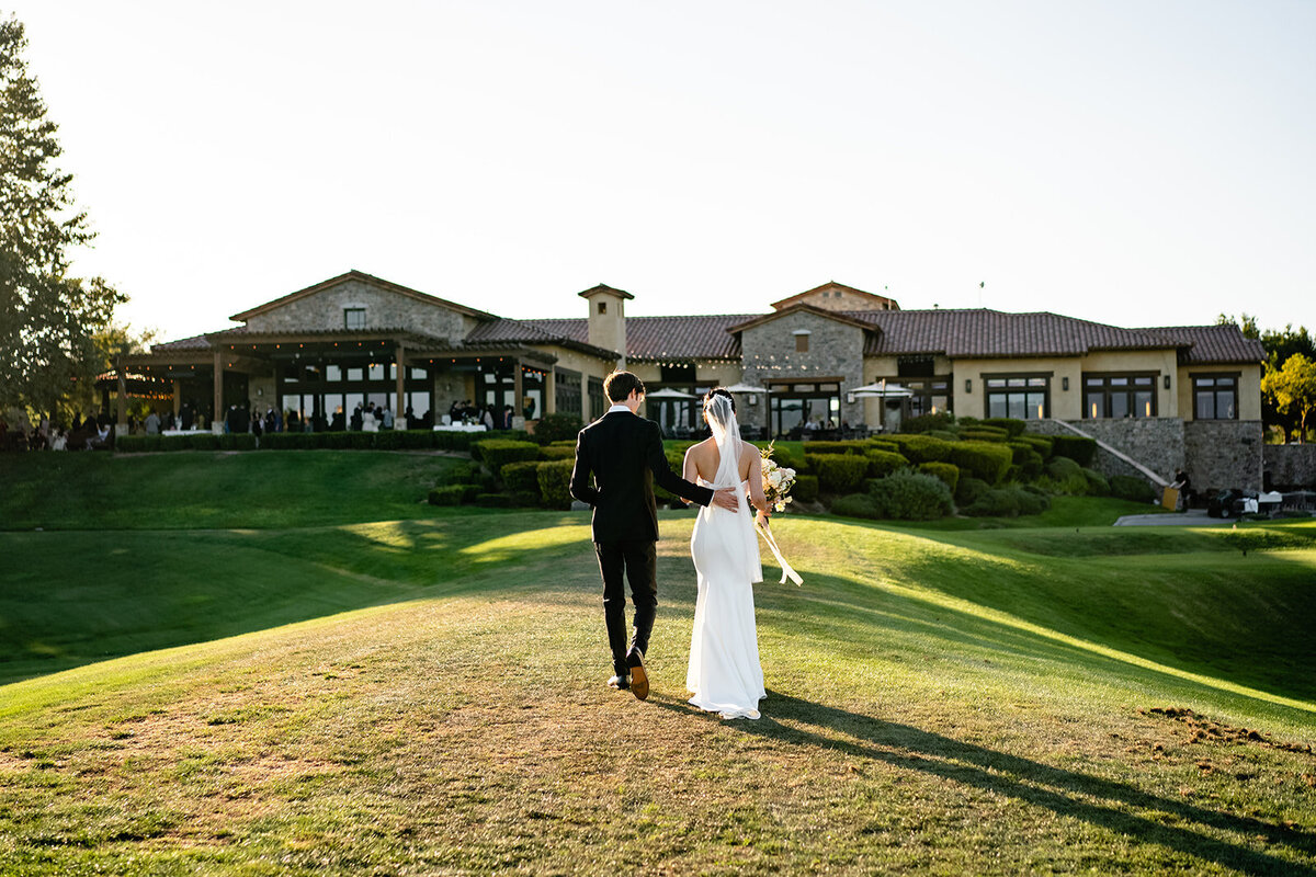 Groom and Bride walk back together after ceremony