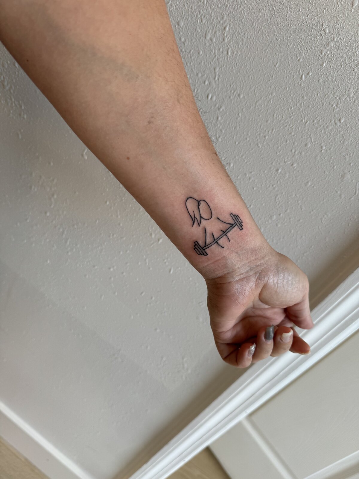 weights tattoo