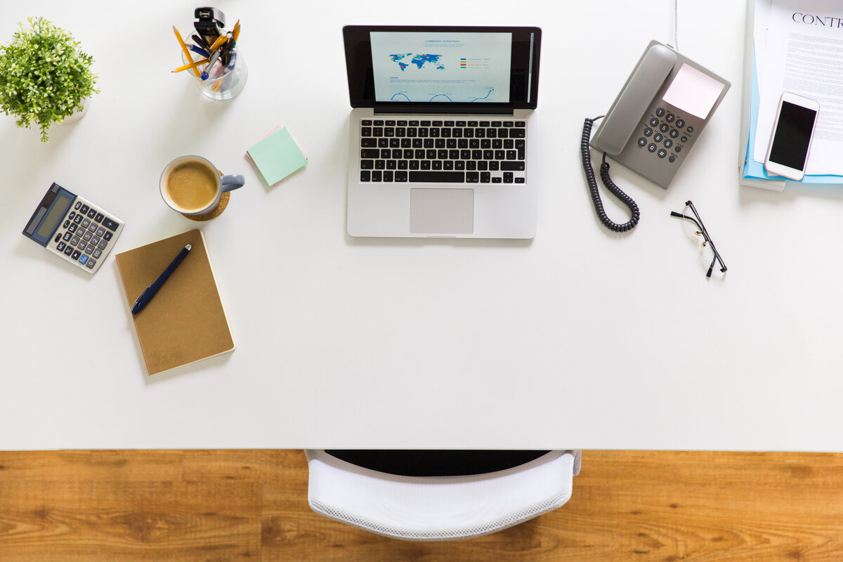 laptop-phone-and-other-office-stuff-on-table-2024-09-28-03-10-43-utc