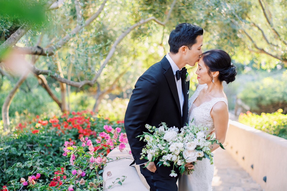 Elegant Villa Verano wedding in Santa Barbara featuring a stunning couple surrounded by lush gardens and timeless luxury. Perfect for couples seeking high-end wedding inspiration and professional photography.