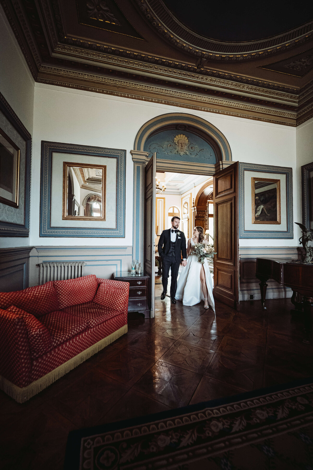 wedding-couple-walking-inside-chateaudelavalouze