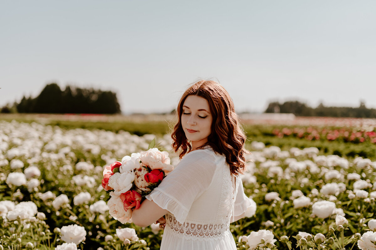 female portraits in flower field by magnolia june visuals