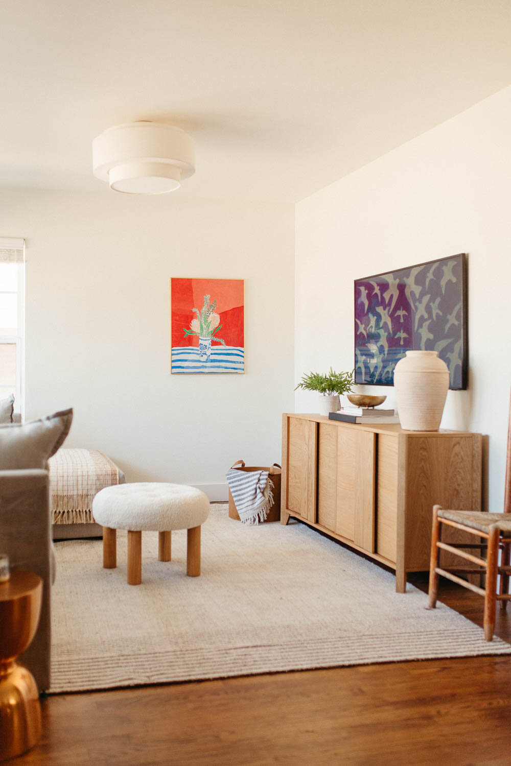 Bright, unique bedroom design with pops of color designed by Hope Miriam Designs in DFW