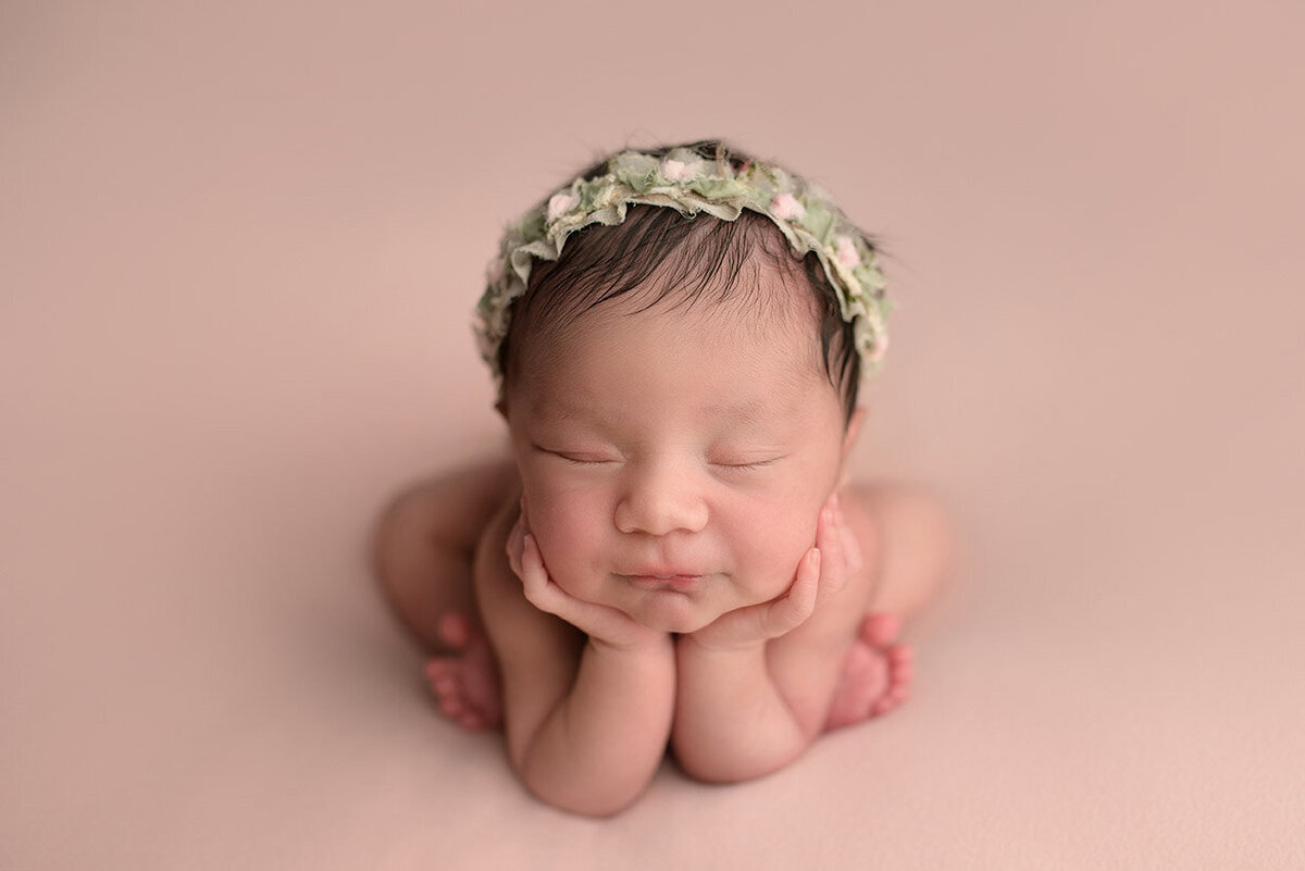 newborn in froggy pose