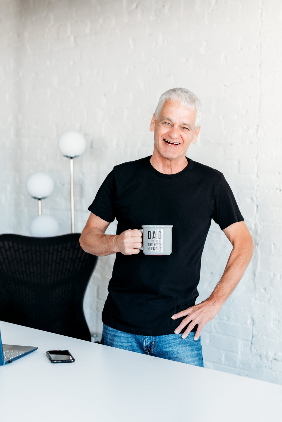Branding photo of a creative entrepreneur in their studio, showcasing professional brand photography in Minnesota.