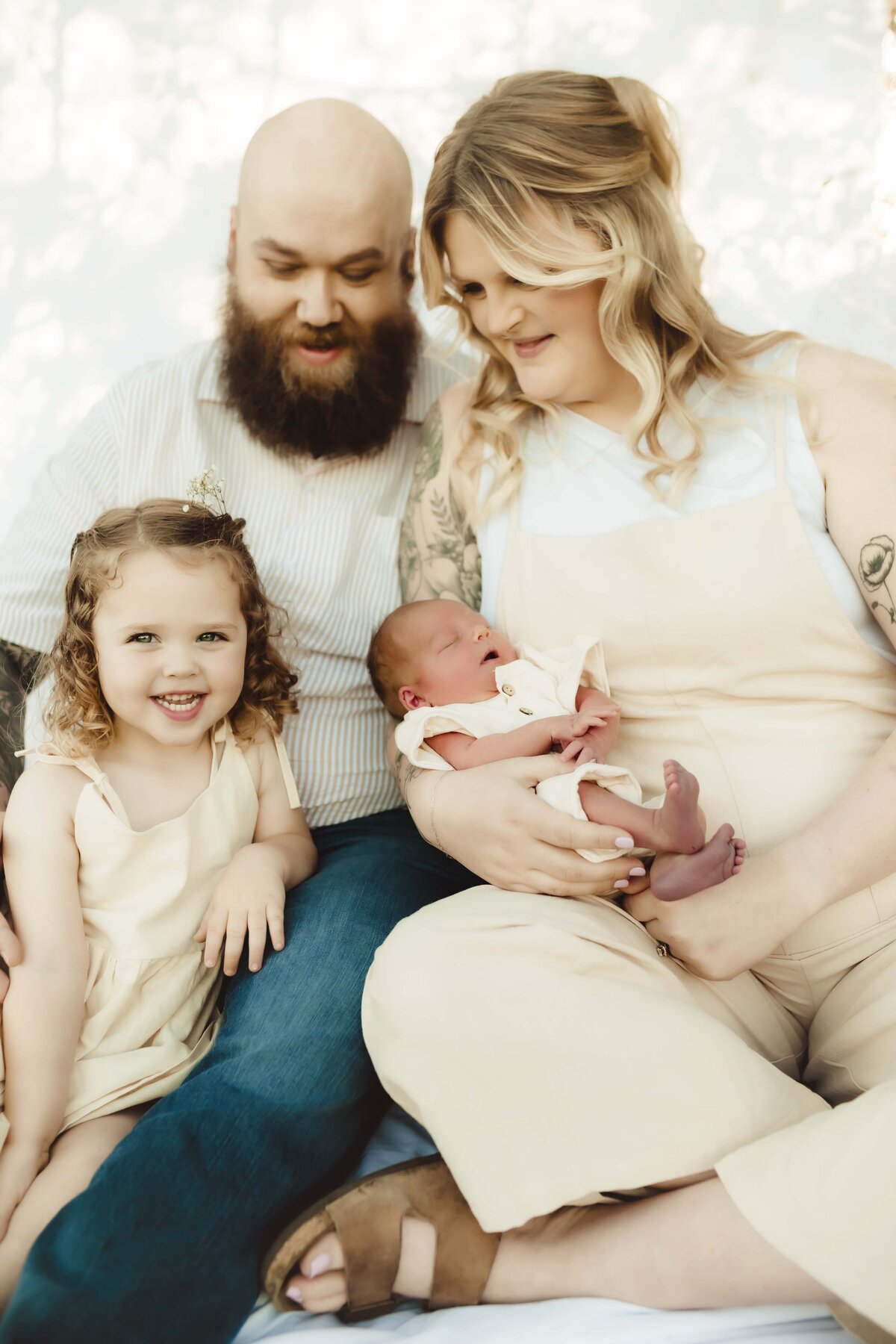 Lifestyle outdoor newborn session during golden hour on a spring Missouri day