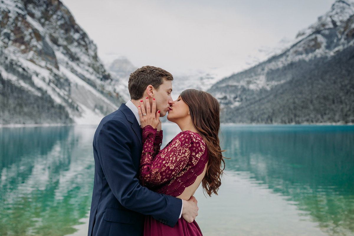 lake louise in late fall with green water snow formal engagement photos