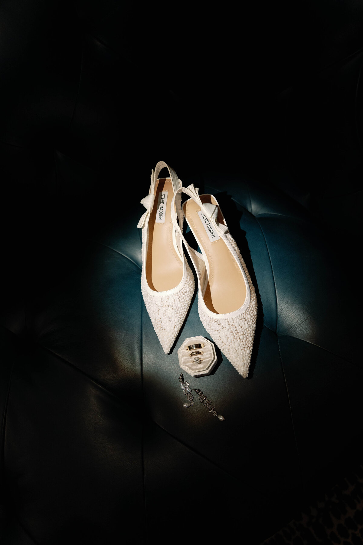 Elegant bridal heels and engagement ring flat lay by Clar Barron Photo