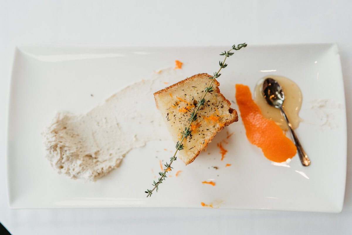 overhead shot of a dessert plated with orange peel