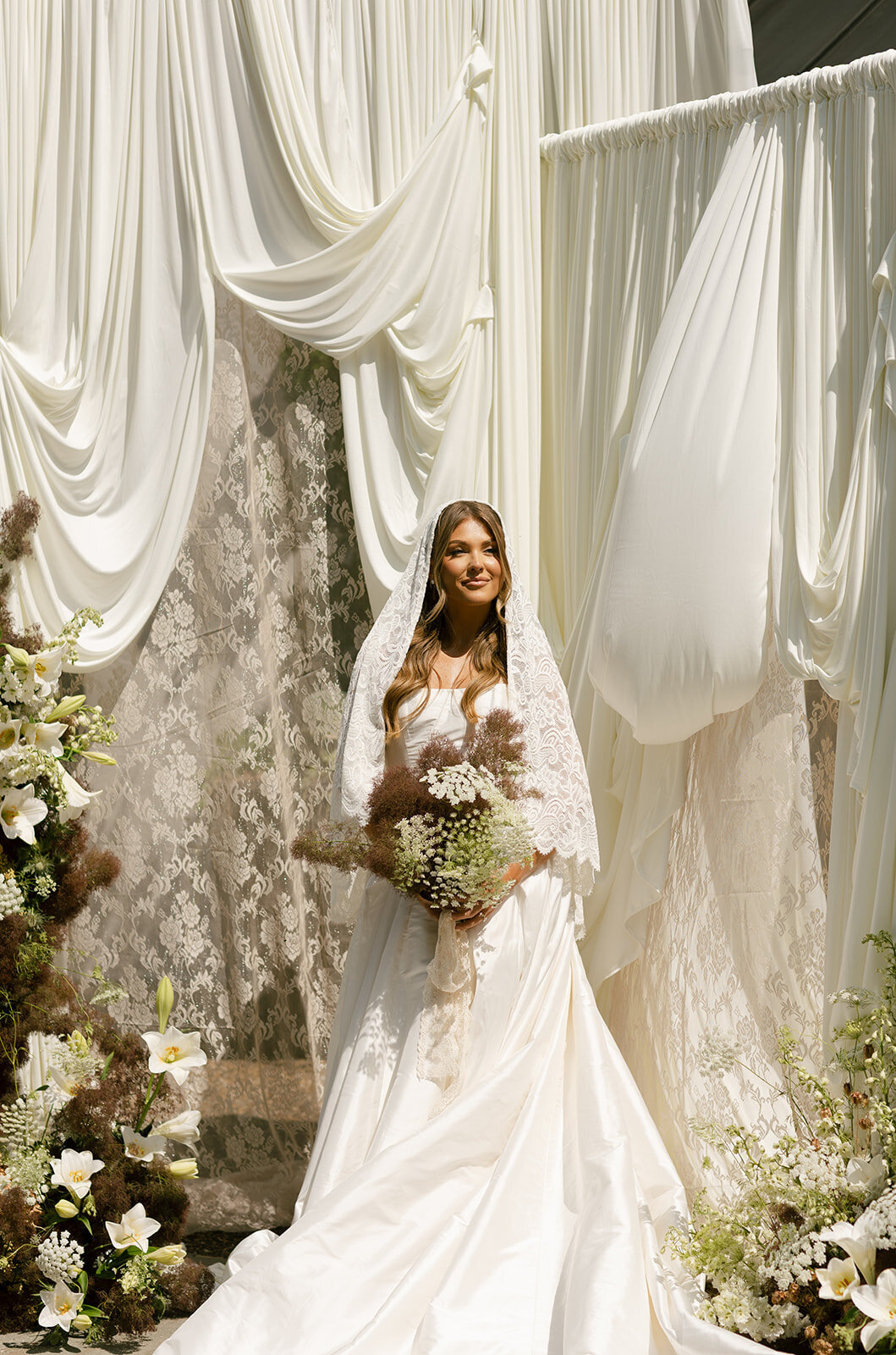Bride and groom portraits in uptown Charlotte after a Honey & Thyme Events wedding