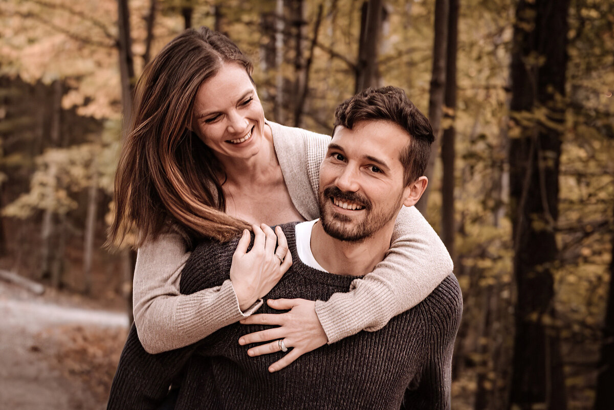 Couple embracing in a forrest