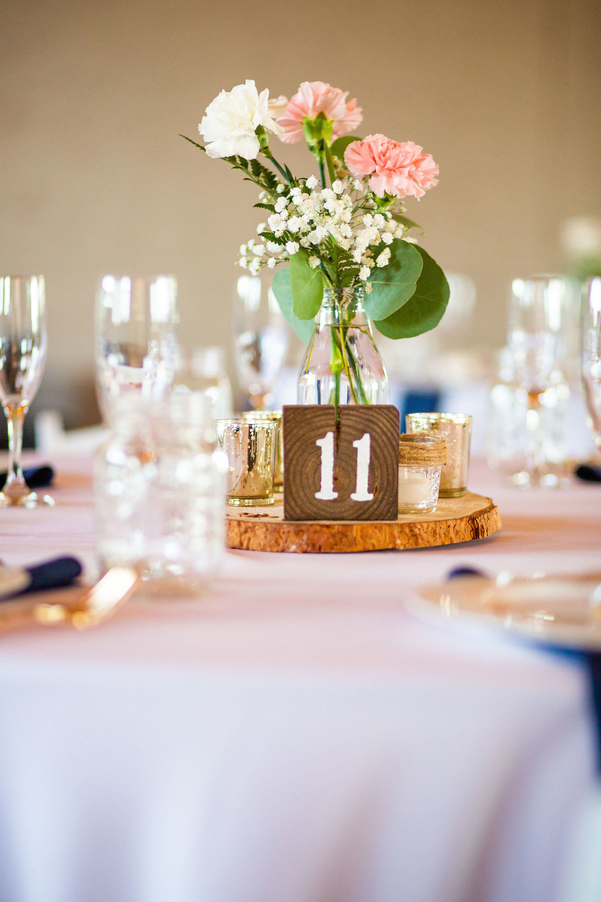 Strawberry-Creek-Ranch-Wedding-Ashley-McKenzie-Photography-Summer-love-on-the-ranch-Table-centerpieces