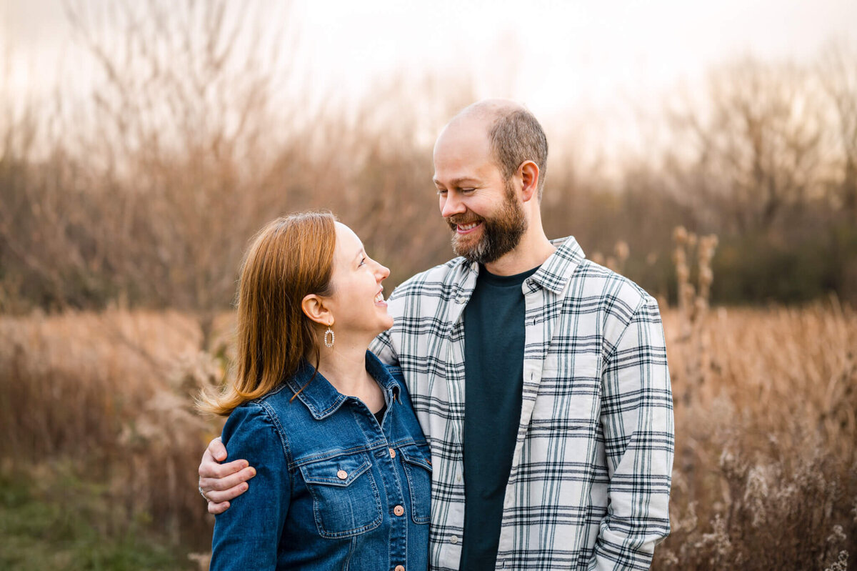 Mom and dad smiling at each other
