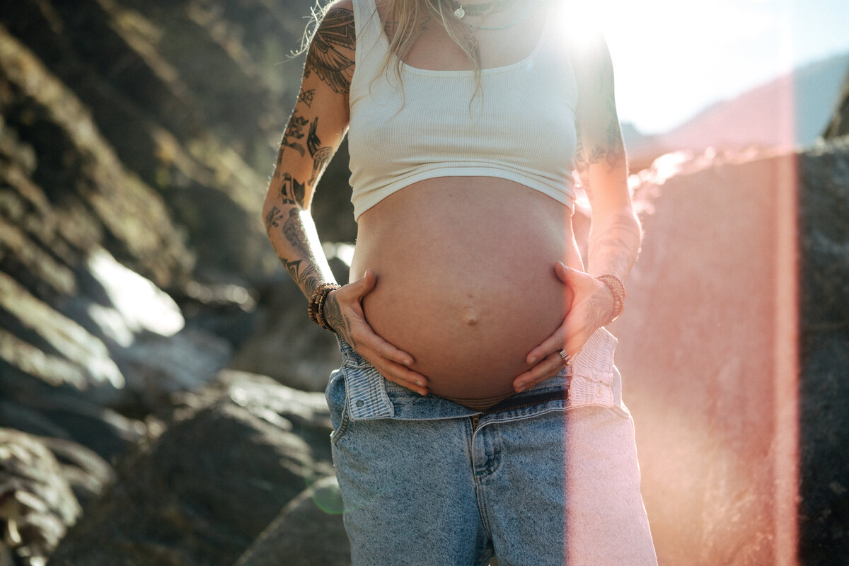 Couple during golden hour engagement and maternity shoot in Riggins, Idaho wedding/elopement - photographed by The Storytellers