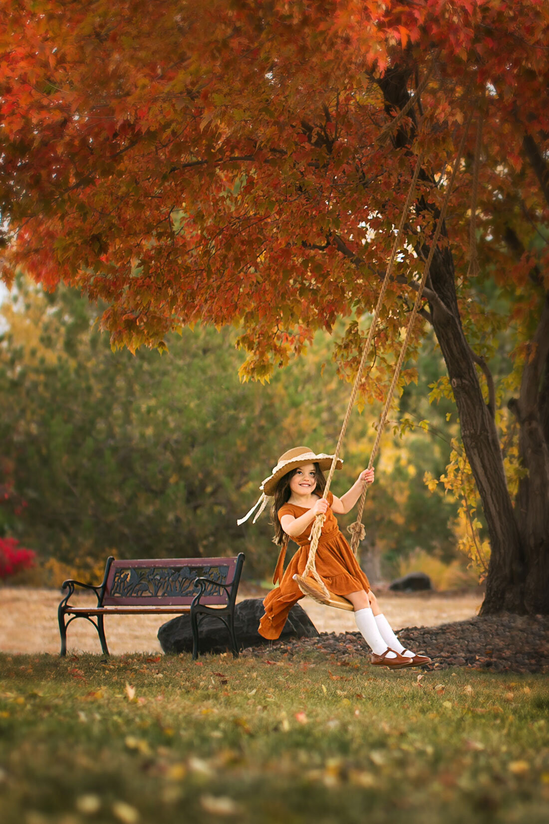 girl-swing-on-tree-vintage-cute-little-fall-autumn-leaves-red-orange-brighton-toddcreek-colorado-children-portrait-photgrapher
