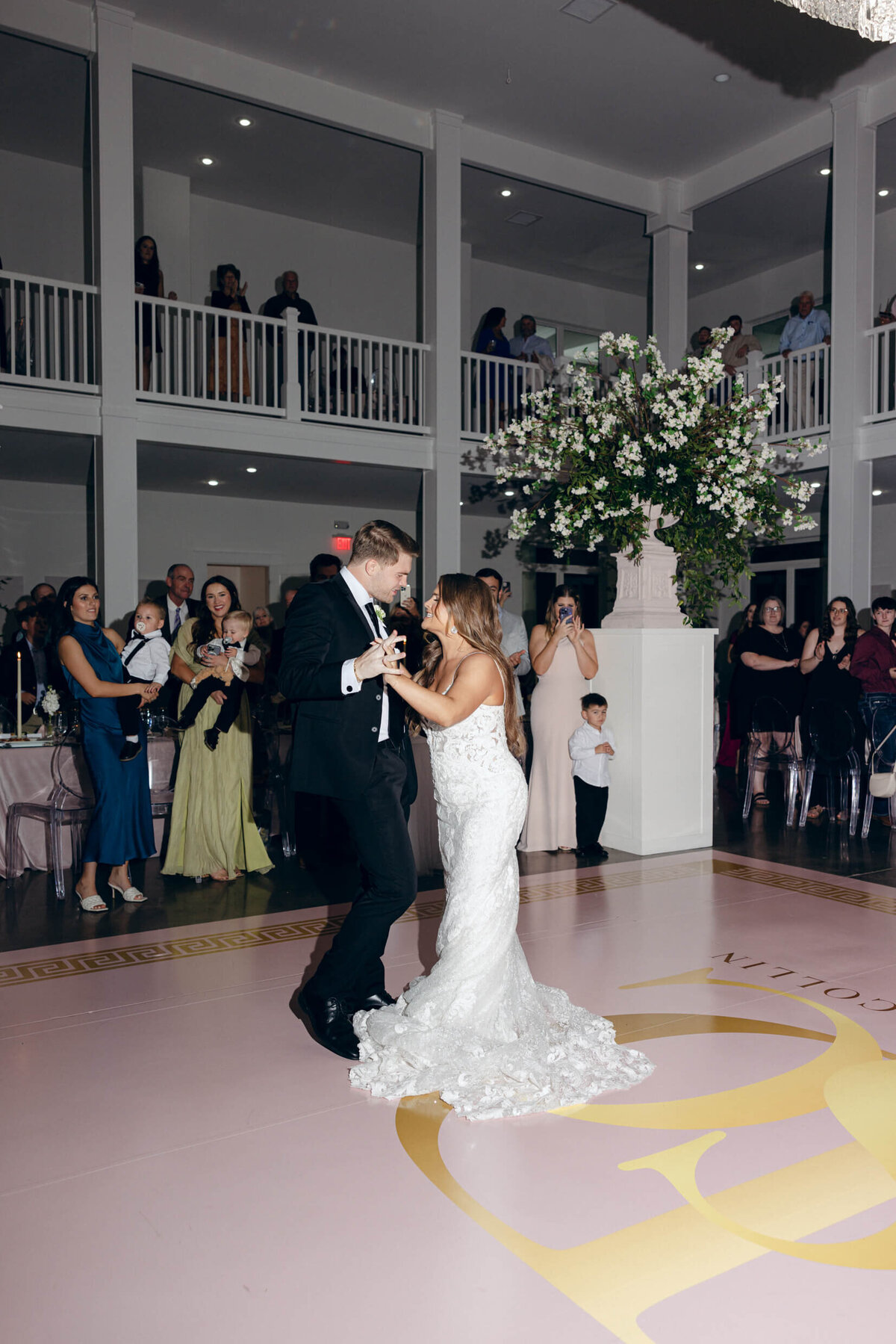 A photo of the bride and groom dancing during the wedding reception