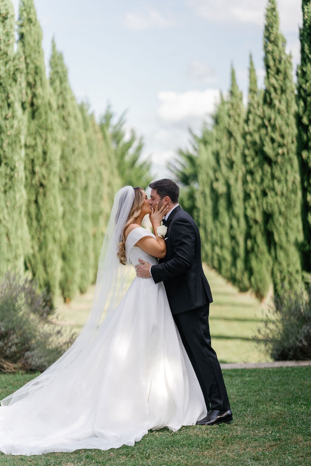 bride-groom-kissing-french-country