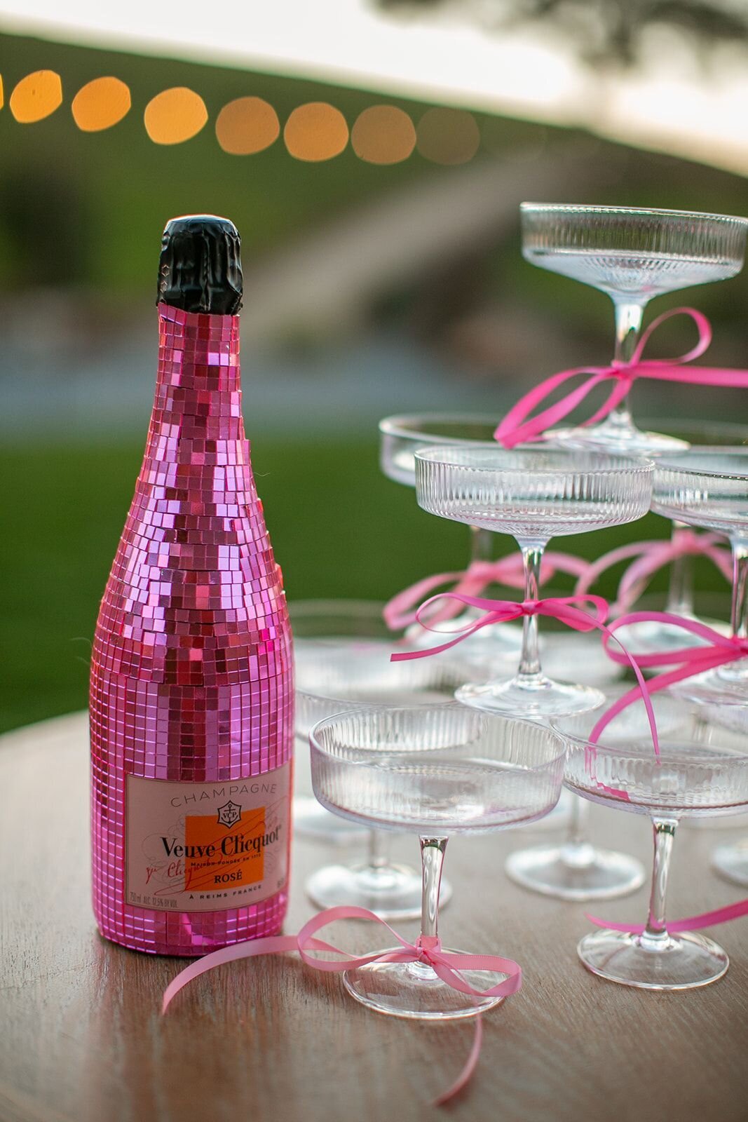 pink-disco-ball-champagne-with-bows