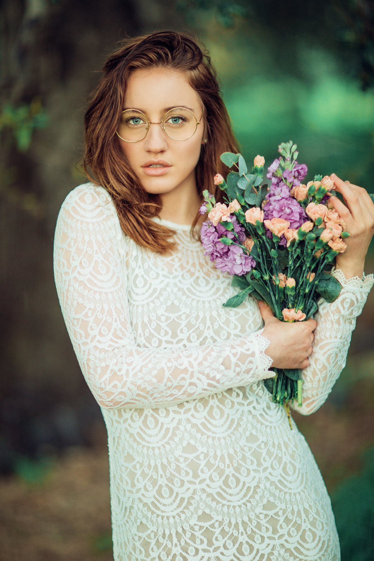 Young Woman With Flowers in Dress Portrait Photography