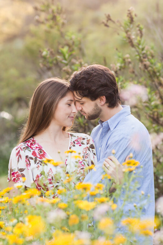 couple in a field of flowers