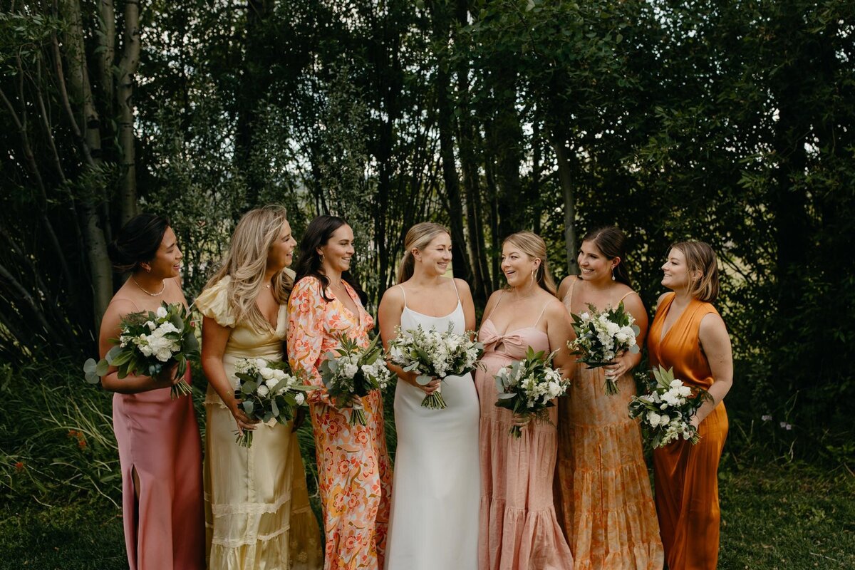 Bride-bridesmaids-Diamond-Cross-Ranch-wedding-orange-peach-pink-dresses